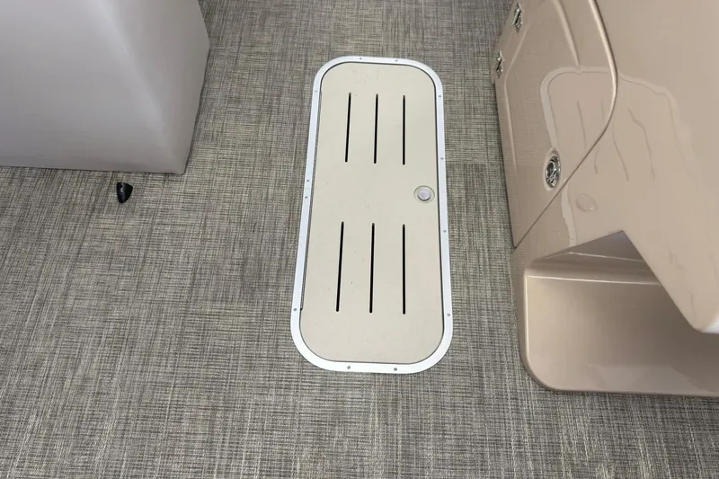 Slide: The Image of 2026 Bentley Pontoons Legacy 223 Swingback interior floor hatch detail. - 8
