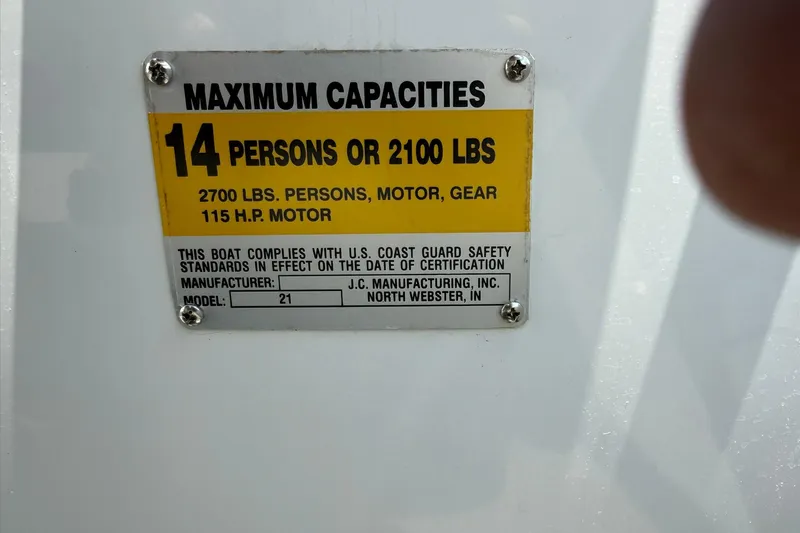 Slide: The Image of Capacity label for 2010 JC 21 Neptoon boat, 14 persons or 2100 lbs. - 14