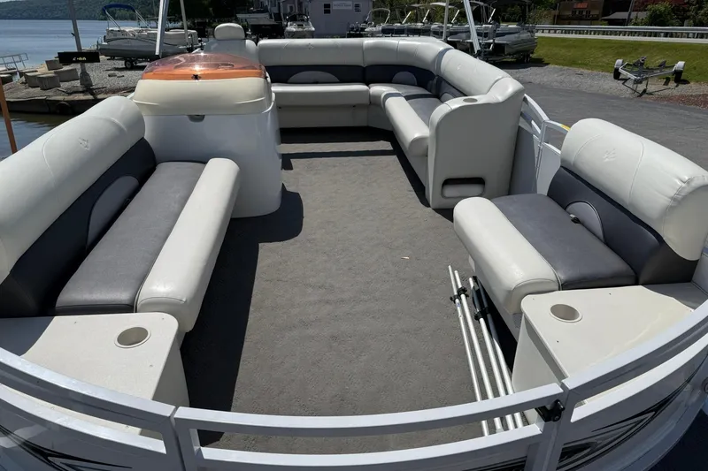 Slide: The Image of Spacious interior of 2010 JC 21 Neptoon pontoon boat with comfortable seating. - 7