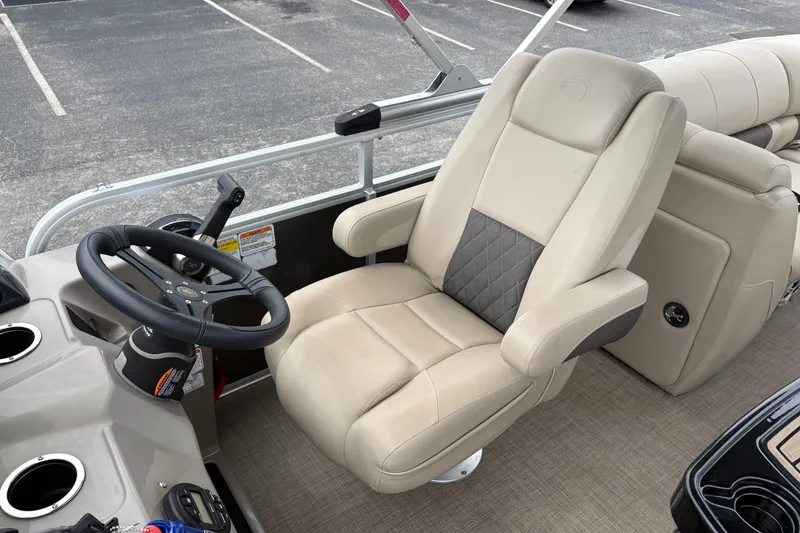 Slide: The Image of 2023 Sun Tracker Party Barge 22 DLX captain's chair and steering console. - 12