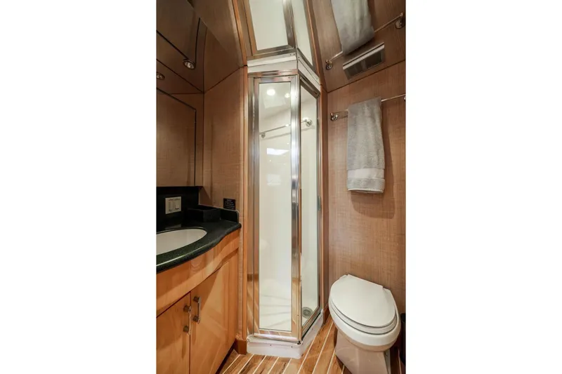 Slide: The Image of Luxurious bathroom in 2003 Hatteras 60 Convertible yacht with shower and modern fixtures. - 8