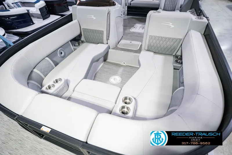 Slide: The Image of Interior of a 2022 Bennington 23 LTSB pontoon boat with luxurious seating. - 13