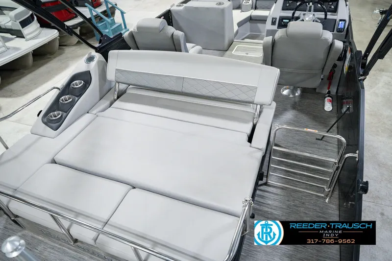 Slide: The Image of 2022 Bennington 23 LTSB boat interior with plush seating and modern amenities. - 16
