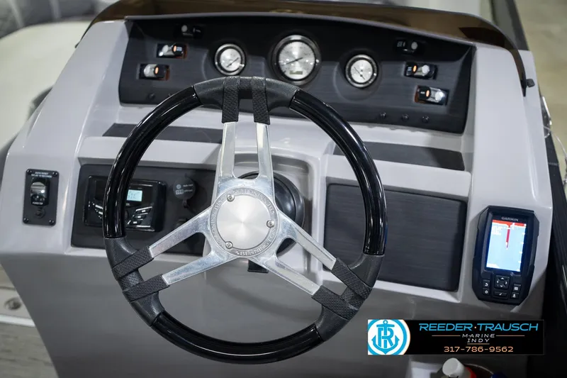 Slide: The Image of Steering console of 2022 Bennington 23 LTSB boat with gauges and navigation system. - 38