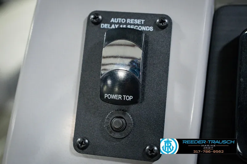 Slide: The Image of Power top switch on 2022 Bennington 23 LTSB boat dashboard. - 41
