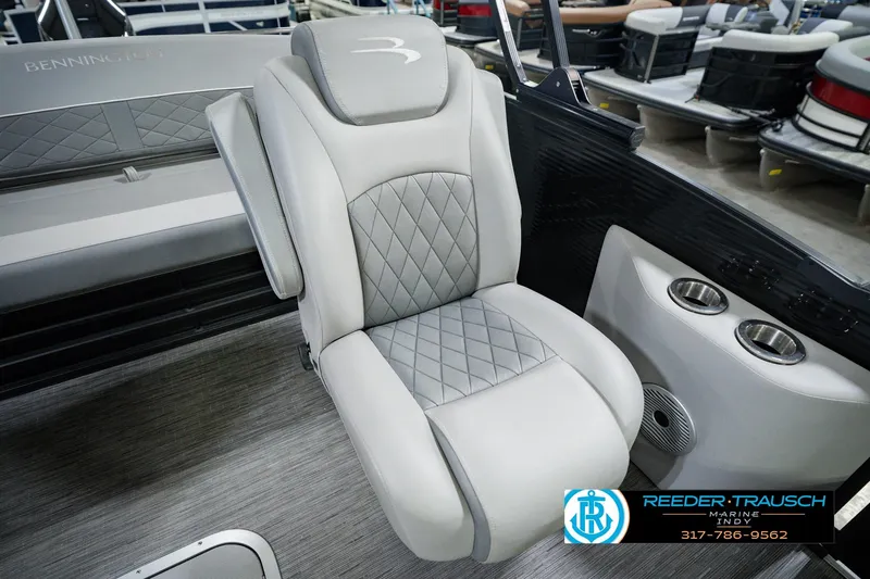 Slide: The Image of Luxury seating on a 2022 Bennington 23 LTSB pontoon boat, featuring elegant gray upholstery. - 51
