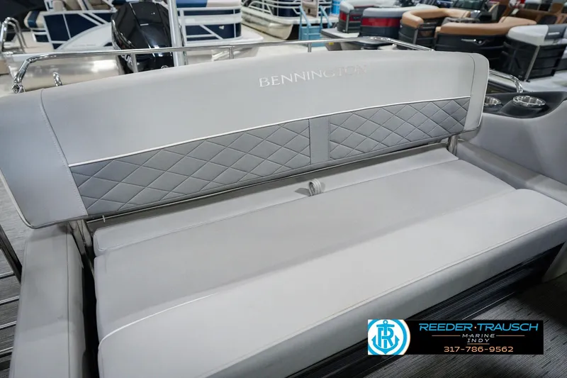 Slide: The Image of 2022 Bennington 23 LTSB boat interior with gray quilted seating at Reeder Trausch Marine. - 52