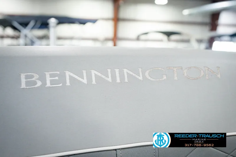 Slide: The Image of 2022 Bennington 23 LTSB boat interior with logo, showcased at Reeder Trausch Marine. - 53
