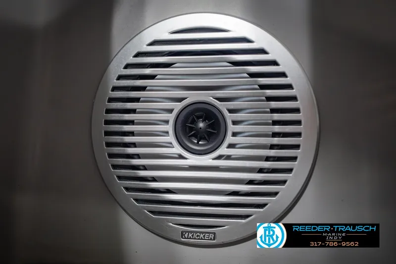 Slide: The Image of Speaker grille on a 2022 Bennington 23 LTSB boat, featuring Kicker audio system. - 55