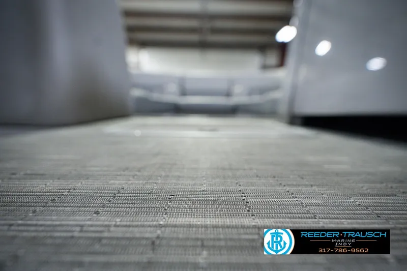 Slide: The Image of 2022 Bennington 23 LTSB boat interior flooring, showcasing sleek design and craftsmanship. - 58