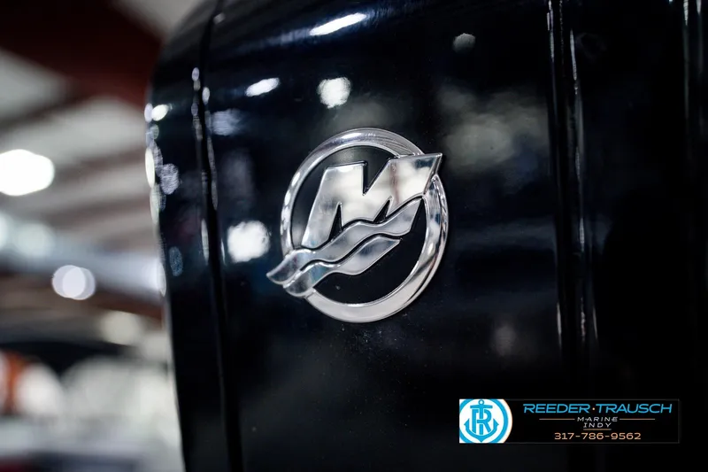 Slide: The Image of Close-up of a 2022 Bennington 23 LTSB boat emblem indoors. - 62