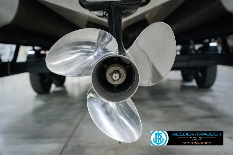 Slide: The Image of Close-up of a 2022 Bennington 23 LTSB boat propeller in a showroom. - 63