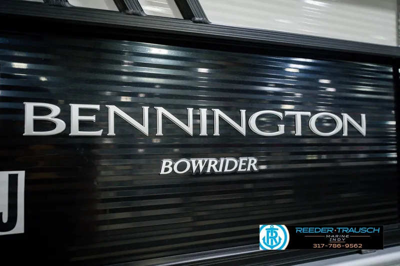Slide: The Image of 2022 Bennington 23 LTSB Bowrider boat with sleek black exterior design. - 65