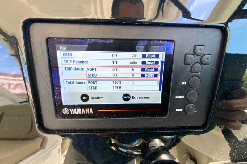 Slide: The Image of Yamaha display showing trip data on a 2021 Pursuit DC 266 Dual Console boat. - 23