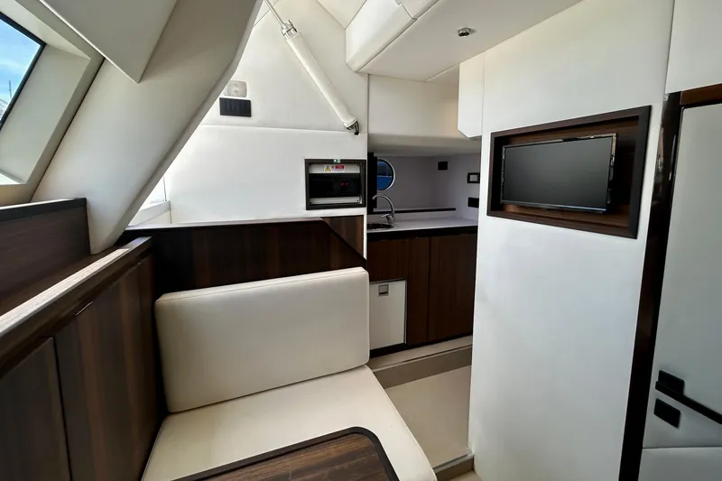 Slide: The Image of Crew Quarters of 2024 Aicon Vivere 66 yacht with modern seating and sleek design. - 112