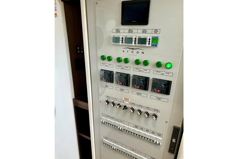 Slide: The Image of Control panel of 2024 Aicon Vivere 66 yacht with switches and indicators. - 119