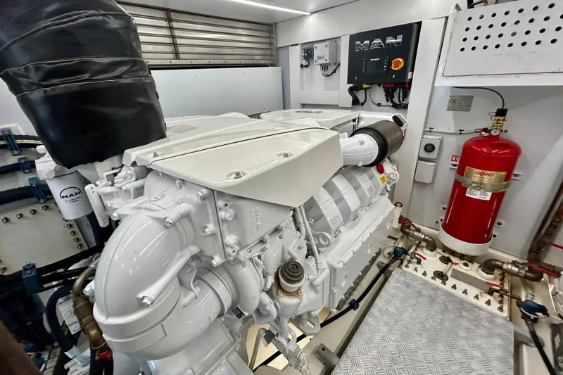 Slide: The Image of Engine room of 2024 Aicon Vivere 66 yacht featuring MAN engine and safety equipment. - 124