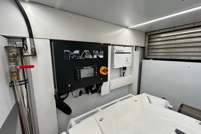 Slide: The Image of Engine room of 2024 Aicon Vivere 66 yacht featuring MAN control panel and Aventics system. - 126