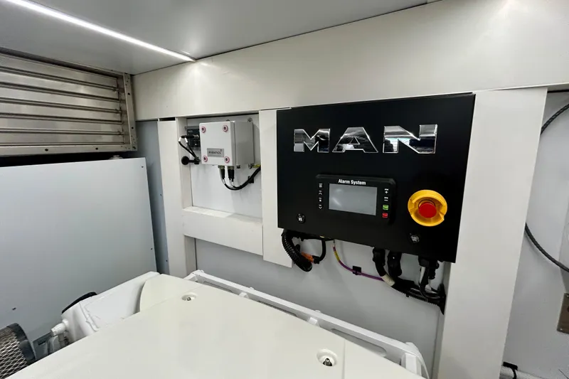 Slide: The Image of Control panel inside 2024 Aicon Vivere 66 yacht engine room, featuring MAN alarm system. - 127
