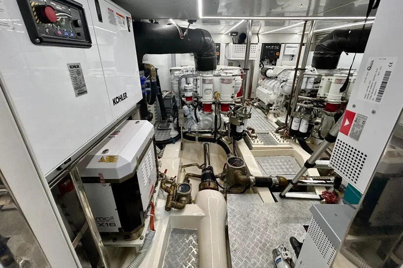 Slide: The Image of Engine room of 2024 Aicon Vivere 66 yacht, featuring Kohler generators and advanced machinery. - 135