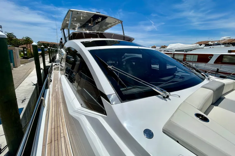 Slide: The Image of 2024 Aicon Vivere 66 yacht docked, showcasing sleek design and luxurious features. - 20