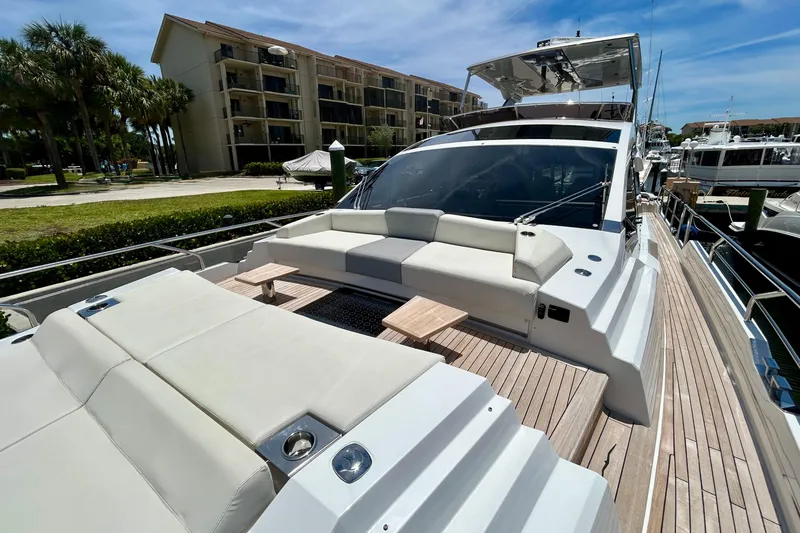 Slide: The Image of Luxurious 2024 Aicon Vivere 66 yacht with spacious deck and modern seating area. - 24