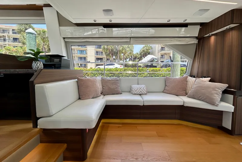 Slide: The Image of Luxurious interior of 2024 Aicon Vivere 66 yacht with plush seating and modern design. - 31