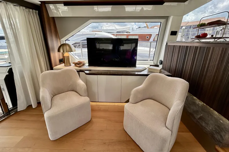 Slide: The Image of Luxurious interior of 2024 Aicon 66 Vivere yacht with elegant seating and modern decor. - 33