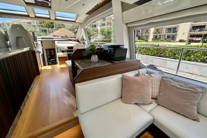 Slide: The Image of Luxurious interior of 2024 Aicon Vivere 66 yacht with modern design and plush seating. - 38
