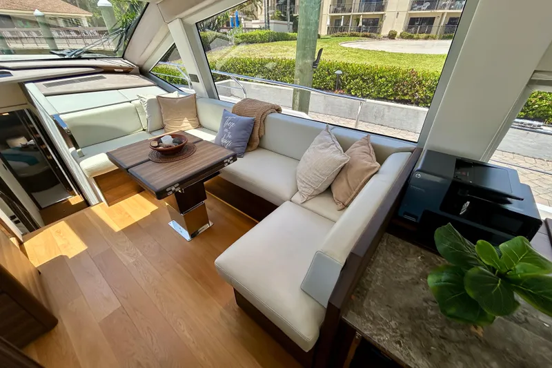 Slide: The Image of Luxurious interior of 2024 Aicon Vivere 66 yacht with elegant seating and modern decor. - 40