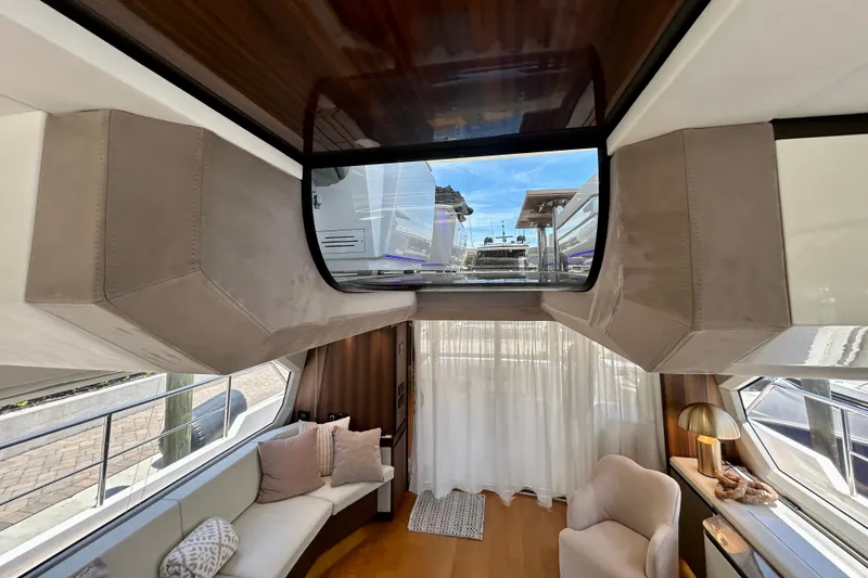 Slide: The Image of Luxurious interior of 2024 Aicon Vivere 66 yacht with elegant seating and modern decor. - 42