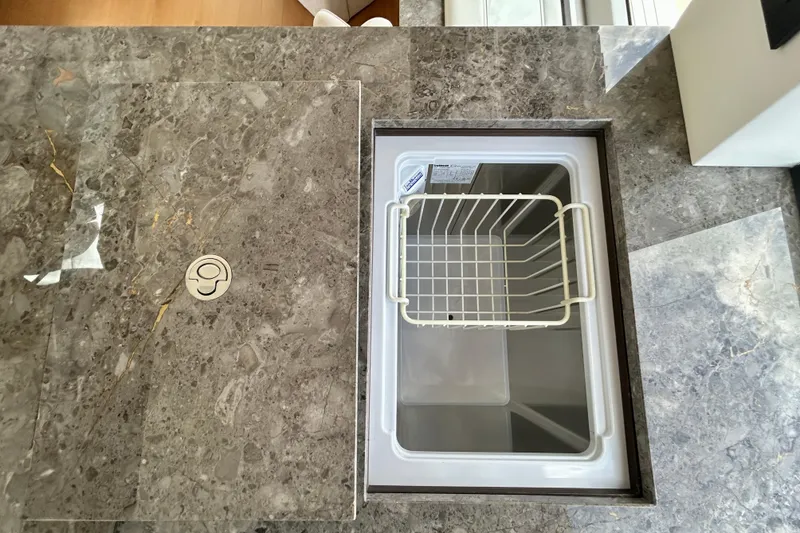 Slide: The Image of Marble countertop with integrated sink on Aicon 66 Vivere yacht, 2024 model. - 50