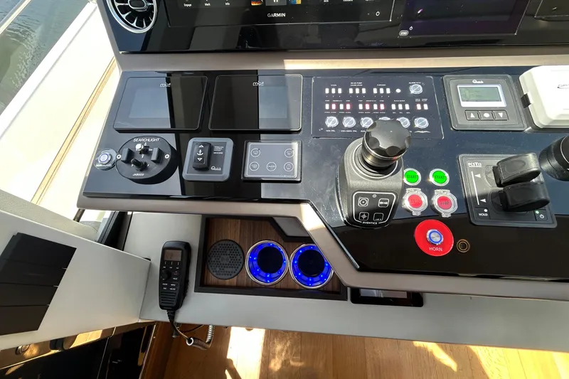 Slide: The Image of Control panel of 2024 Aicon Vivere 66 yacht with advanced navigation and communication systems. - 58
