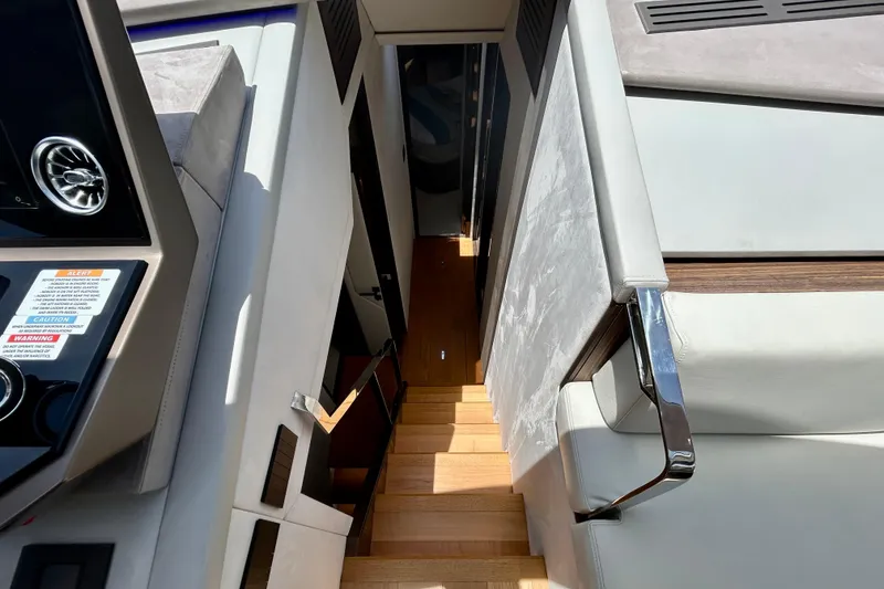 Slide: The Image of Interior staircase of 2024 Aicon Vivere 66 yacht, featuring sleek design and modern materials. - 62