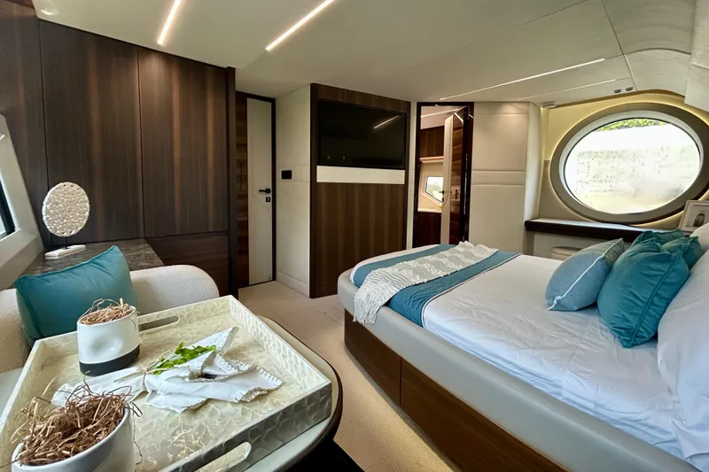 Slide: The Image of Luxurious interior of 2024 Aicon Vivere 66 yacht with elegant bedroom and modern decor. - 67