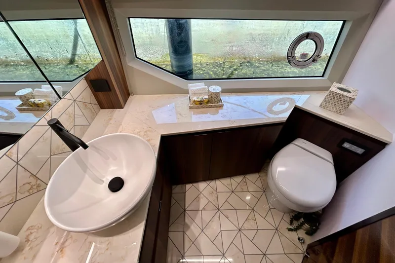 Slide: The Image of Luxurious bathroom interior of 2024 Aicon Vivere 66 yacht with modern fixtures and elegant design. - 73