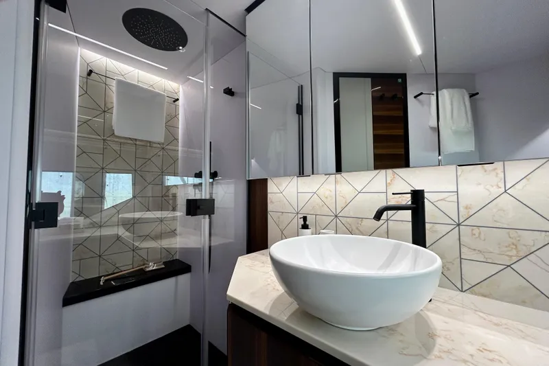 Slide: The Image of Luxurious bathroom in 2024 Aicon Vivere 66 yacht with modern fixtures and elegant design. - 74