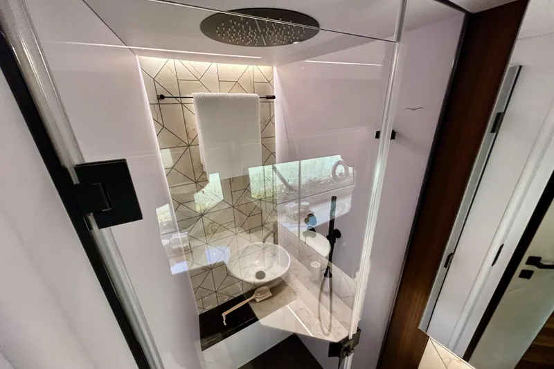 Slide: The Image of Luxurious bathroom in 2024 Aicon Vivere 66 yacht, featuring modern fixtures and elegant design. - 75
