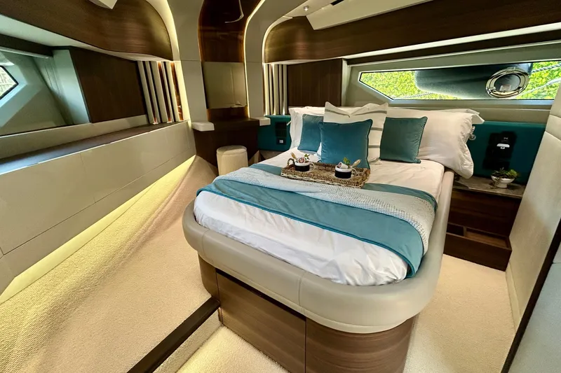 Slide: The Image of Luxurious bedroom interior of 2024 Aicon Vivere 66 yacht with elegant bedding and modern design. - 76