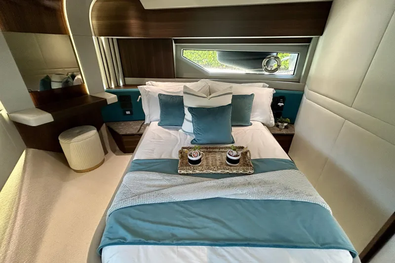Slide: The Image of Luxurious bedroom interior of 2024 Aicon Vivere 66 yacht with elegant bedding and decor. - 77