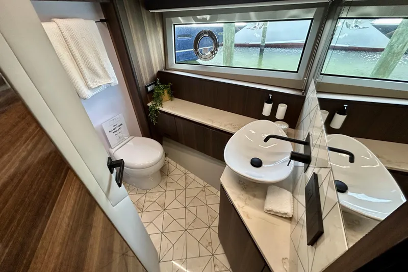Slide: The Image of Luxurious bathroom in 2024 Aicon Vivere 66 yacht with modern fixtures and elegant design. - 81