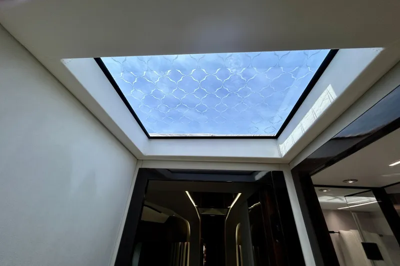 Slide: The Image of Skylight view inside 2024 Aicon Vivere 66 yacht, showcasing elegant interior design. - 84