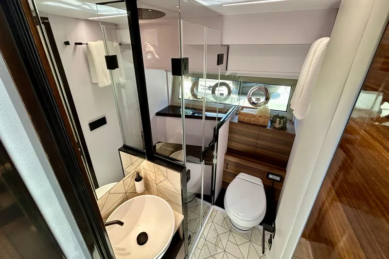 Slide: The Image of Luxurious bathroom in 2024 Aicon Vivere 66 yacht, featuring modern fixtures and elegant design. - 87