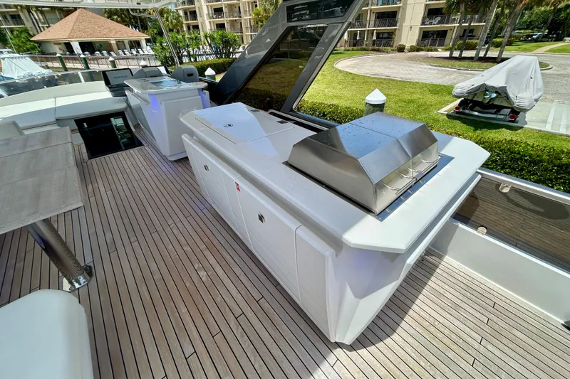 Slide: The Image of Luxurious deck of 2024 Aicon Vivere 66 yacht with modern amenities and sleek design. - 93