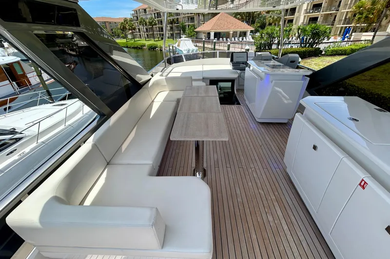 Slide: The Image of Luxurious 2024 Aicon Vivere 66 yacht deck with elegant seating and modern amenities. - 96