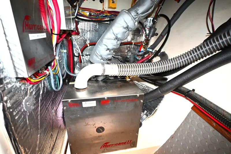 Slide: The Image of Engine room of a 2006 Waterline 50 yacht with Hurricane II heating system. - 104