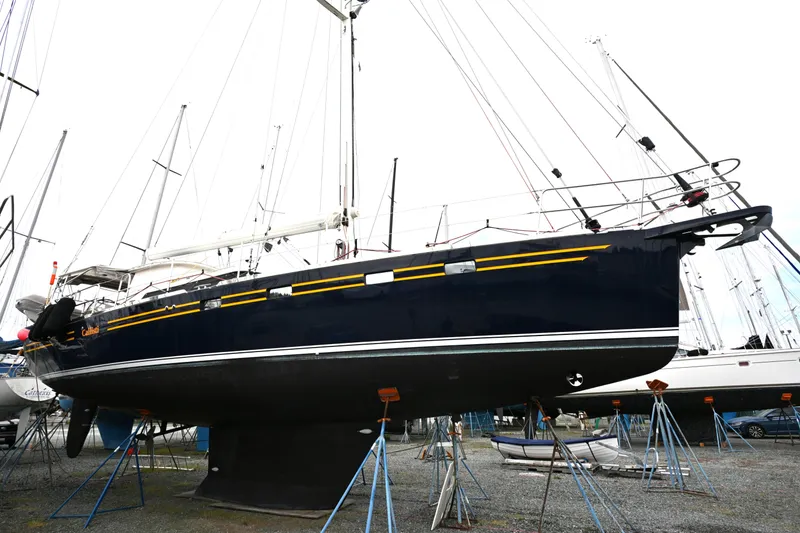 Slide: The Image of Sailboat on stands, Waterline 50 model, 2006, in a boatyard setting. - 107