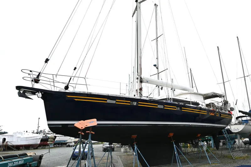 Slide: The Image of Sailboat on stands, Waterline 50 model, 2006, in a boatyard setting. - 108