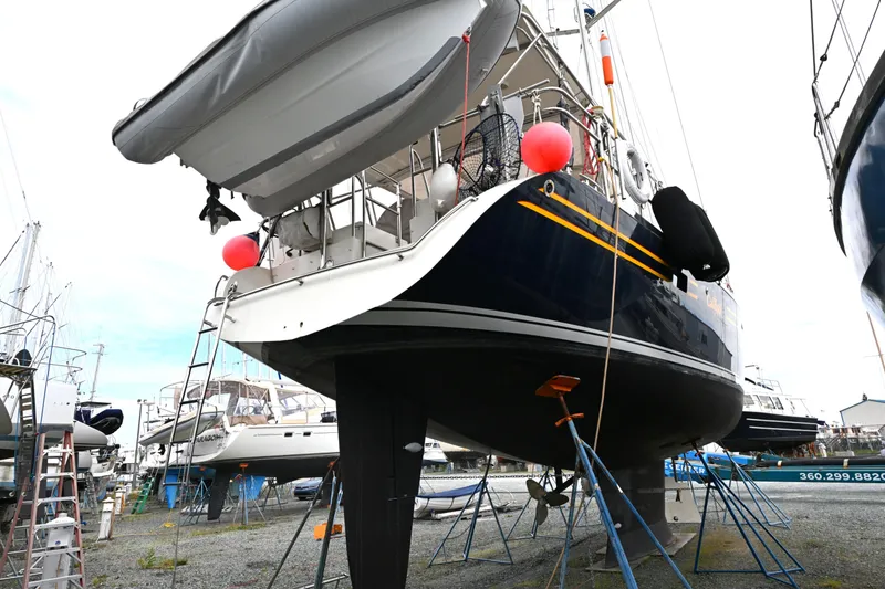 Slide: The Image of Sailboat on dry dock, Waterline 50 model, 2006, with visible keel and propeller. - 111