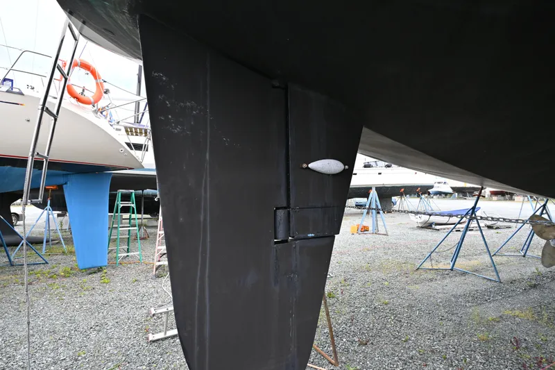 Slide: The Image of Underwater view of a 2006 Waterline 50 sailboat keel in a boatyard. - 114